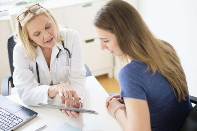 Doctor talking to patient