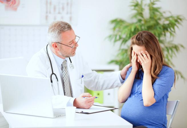 Pregnant woman at doctor's office