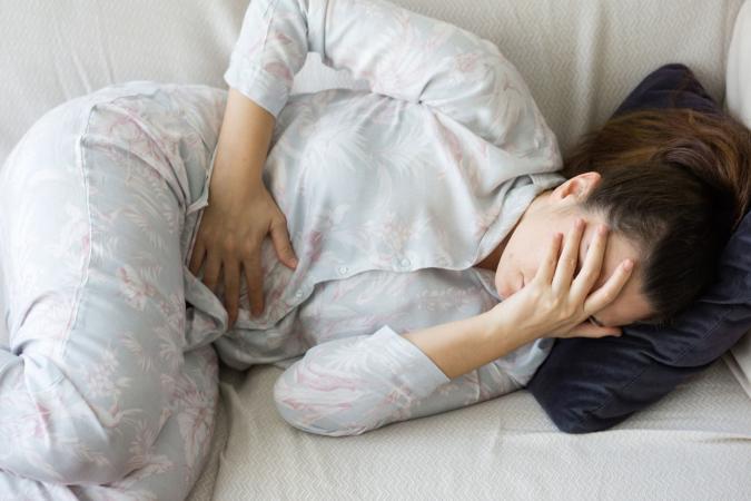 upset woman with cramps