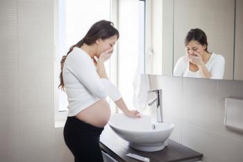 Woman feeling morning sickness