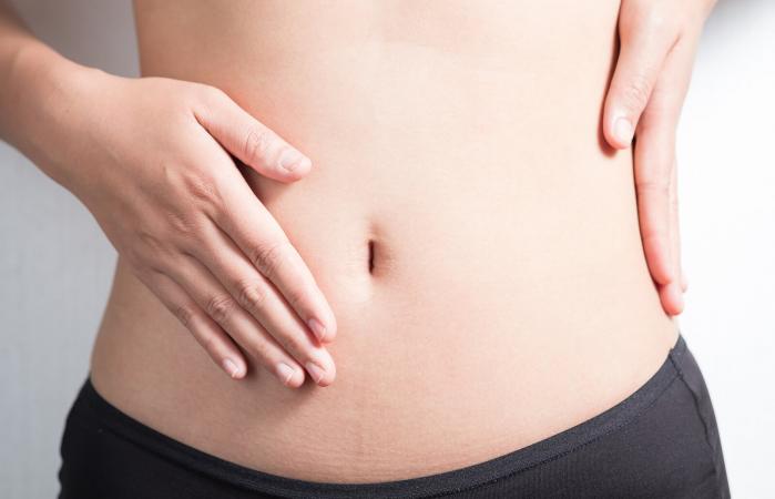 Woman experiencing cramping