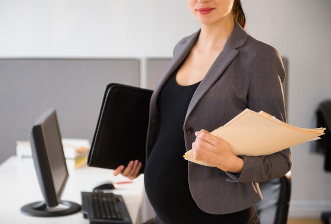 Pregnant Business Woman in Suit