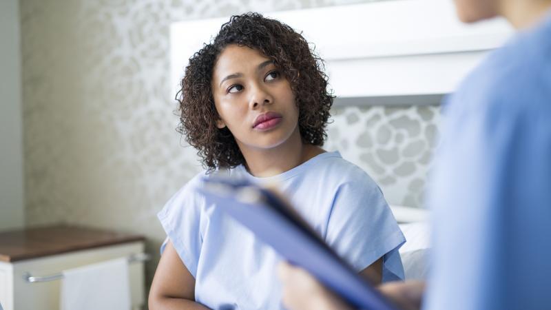 concerned patient consulting with doctor