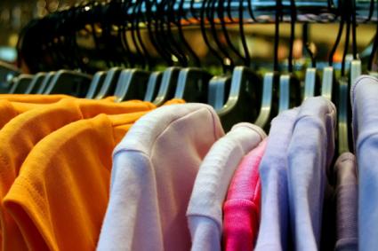 Wholesale maternity tops on a store rack