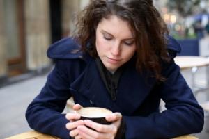 Woman feeling sad over loss