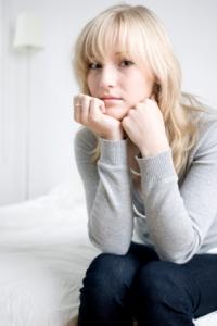 A woman worrying about infertility issues