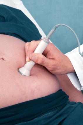 Photo of technician performing an ultrasound