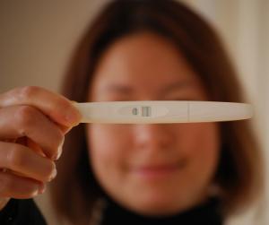 Woman Holding Pregnancy Test