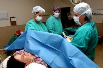 Image of a pregnant woman undergoing a C-section