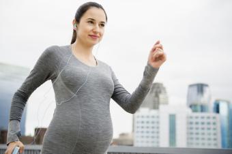 Pregnant woman walking in the city