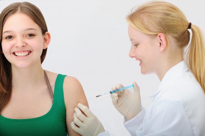Young woman receiving a birth control shot