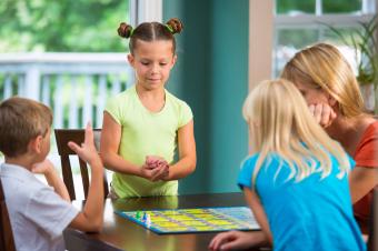 Playing board game with family