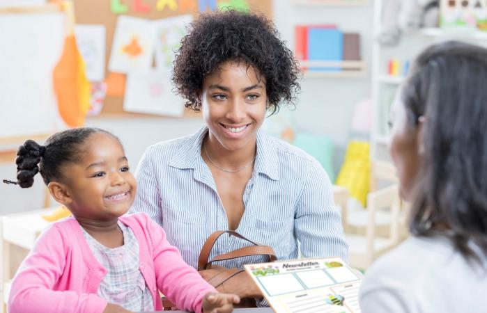 mom talks with teacher