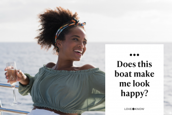 Woman Enjoying a Glass of Champagne on a Luxury Yacht