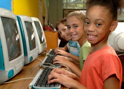 Children using computers at school.
