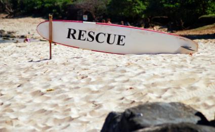 Rescue surfboard on beach