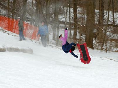 Mid-air sledding accident.