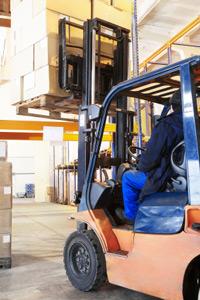 driver of a forklift loader at warehouse