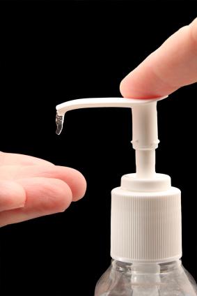 Using hand sanitizer