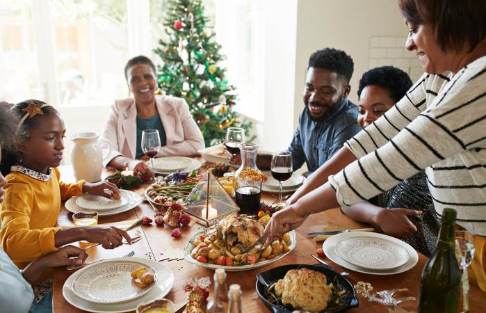 serving holiday food to family
