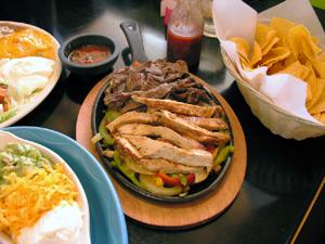 Fajita plate and tortilla chips at a Mexican restaurant