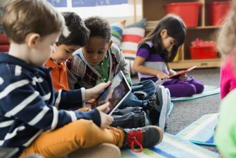 Kids looking at digital tablet