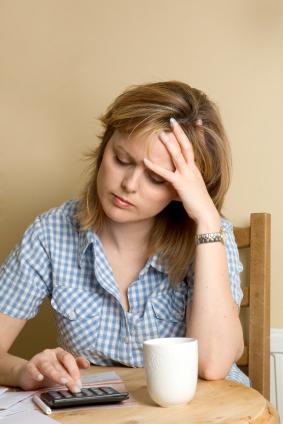 Woman Overwhelmed by Bills