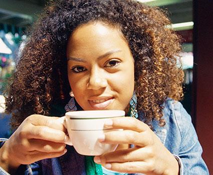 Woman enjoying a cup of coffee