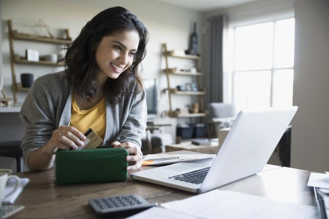 Image of woman shopping at a website