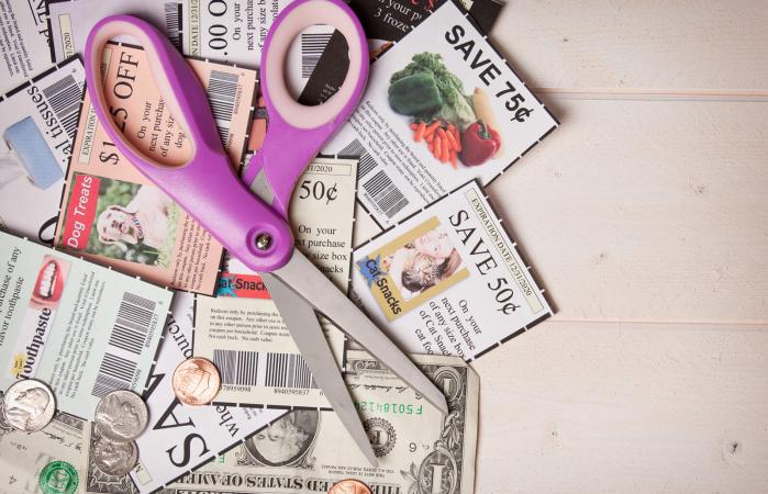 Coupons Pile With Scissors