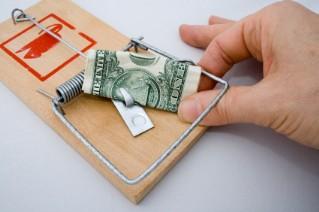 Fingers snapped by mousetrap baited with money