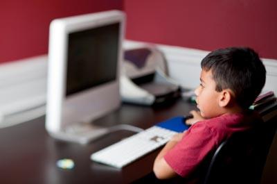 boy using computer