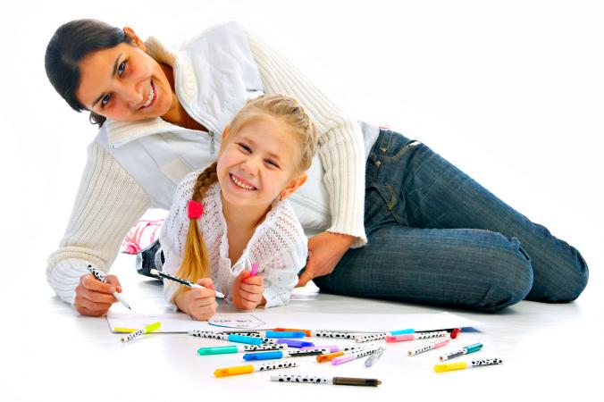 Mother and daughter scrapbooking
