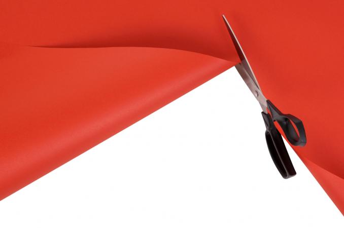 cutting red paper