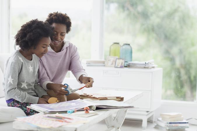 Mother and daughter scrapbooking