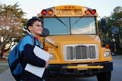 school boy and bus