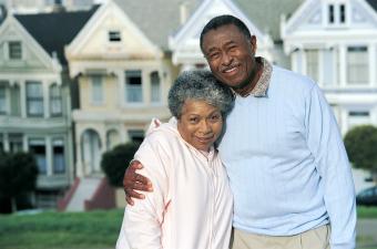 couple in front of San Francisco townhouses