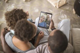 Family video chatting with digital tablet