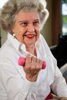 Senior woman doing bicep exercise