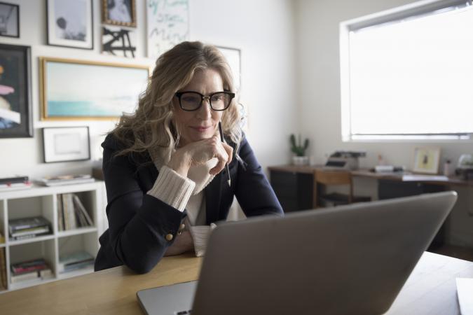 baby boomer working at computer