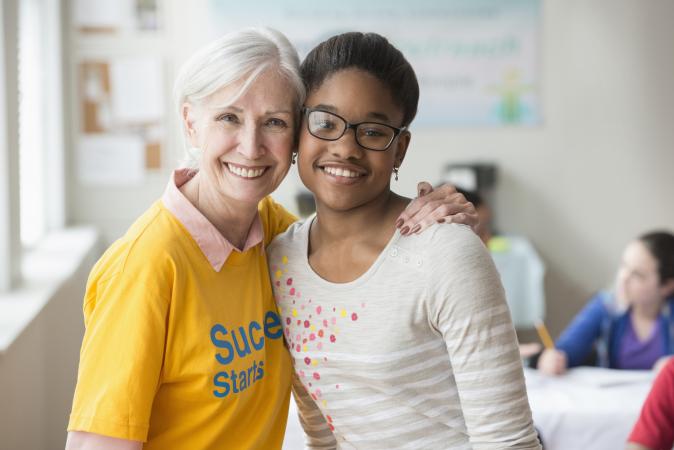 Teacher and student in classroom
