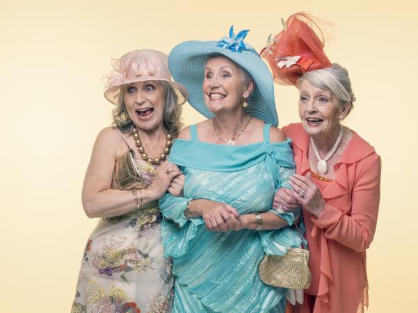 Three senior women dressed up for Easter