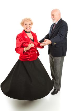 Retired couple having fun ballroom dancing