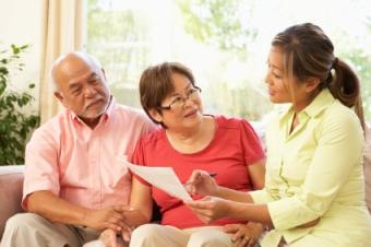 Seniors meeting with geriatric care consultant