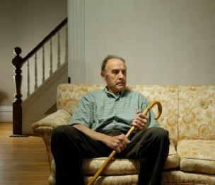 Senior man sitting on a couch