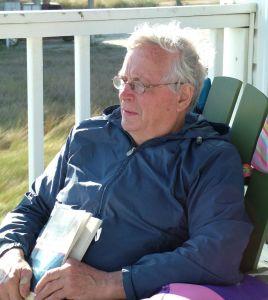 Senior man sitting on a porch