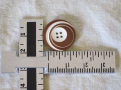 measuring button
