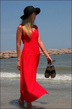 WomanHoldingSandals.jpg