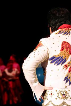 Image of Elvis Presley from behind