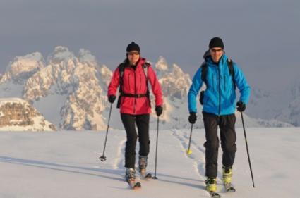 two backcountry skiers